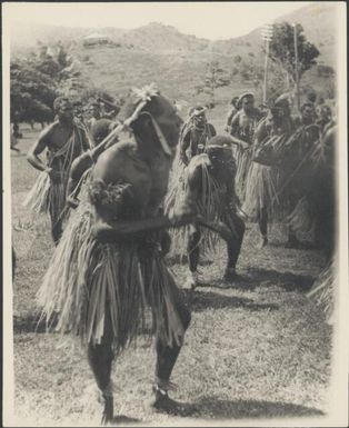 Motuan Western Division male dancers with hand drums, Tahira, Port Moresby, Papua, ca. 1923 / Sarah Chinnery