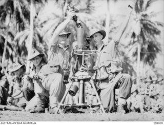 RABAUL, NEW BRITAIN. 1945-10-12. CLOSE UP OF THE PLANE LIKE ATTACHMENTS OF THE JAPANESE WAR HEAD DETONATING DEVICE MARK 1, DISPLAYED BY 33 FIELD SECURITY SECTION