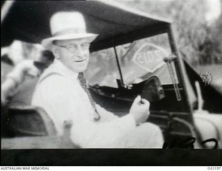 AITAPE, NORTH EAST NEW GUINEA. C. 1944-06. ARTHUR DRAKEFORD, THE MINISTER FOR AIR, IN A JEEP ON A TOUR OF THE RAAF CAMP AREA DURING HIS VISIT TO RAAF UNITS IN THE NEW GUINEA AREA