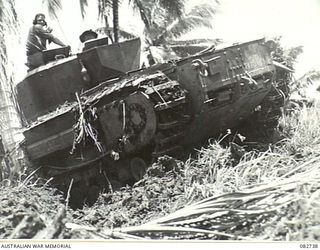 MADANG, NEW GUINEA. 1944-10-12. A CHURCHILL TANK NEGOTIATING SLOPES DURING TESTS AT HQ 4 ARMOURED BRIGADE