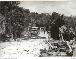 TAUT RIVER, NEW BRITAIN. 1945-02-12. TROOPS OF THE 13TH FIELD COMPANY, BUILDING A NEW ROAD NEAR THE RIVER