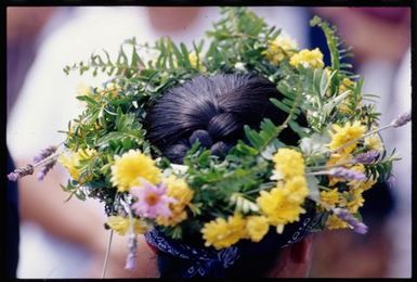 Woman wearing flower garland