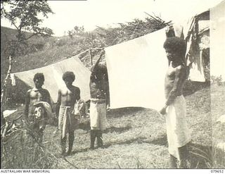 Oro Bay, New Guinea. 1943-04. Native labourers allotted by the Australian New Guinea Administrative Unit (ANGAU) at work in the laundry area of the 10th Field Ambulance, Australian Army Medical ..
