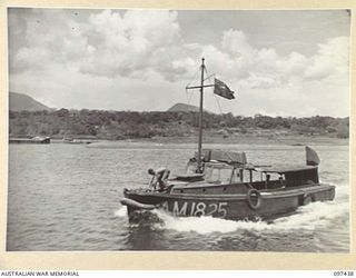 RABAUL, NEW BRITAIN. 1945-10-01. THE AM 1825, THE TYPE OF WORKBOAT OPERATED BY PERSONNEL OF 55 PORT CRAFT COMPANY IN SIMPSON HARBOUR