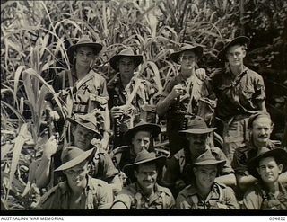 Yara River, New Britain. Group portrait of members of a patrol from the 2/2nd Cavalry Commando Squadron, AIF, on activities in Henry Reid Bay area while the squadron was based at Lamarien. ..