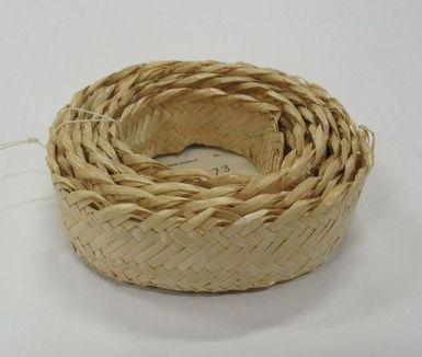 Roll of plaited fibre