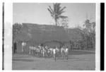 Sione Pasikala, headmaster, and pupils of the Wesleyan primary school, Tongamama'o, Hahake.