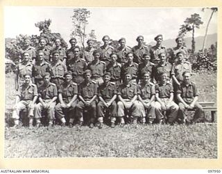 Torokina, Bougainville. 1945-10-12. Group portrait of the officers of 2nd Field Regiment. Left to right, back row: VX87782 Lieutenant (Lt) S. M. Loutit of Melbourne, Vic; NX117624 Captain (Capt) K. ..