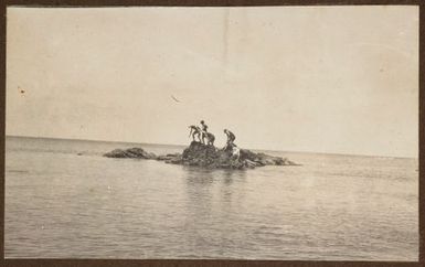 Bathers on a rocky islet. From the album: Samoa