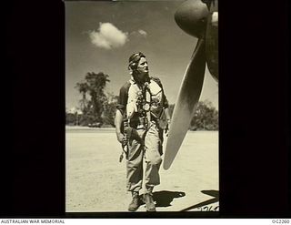 TOROKINA, BOUGAINVILLE ISLAND, SOLOMON ISLANDS. 1945-02-18. 434520 FLYING OFFICER HARRY ROWE, MOSMAN, NSW, AFTER MARCHING WITH AIF INFANTRY OVER THE DESERTS OF BARDIA, SOLLUM, AND MERSA MATRUH, NOW ..