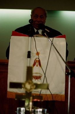 King Taufa'ahau Tupou IV speaking from the pulpit at the dedication of Vaine Mo'onia (The True Vine) church