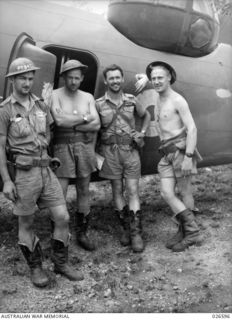 The happy crew of Lockheed Hudson A16-246 of 6 Squadron RAAF after their return from attacking Japanese destroyers which had been shelling Australian positions in Milne Bay during the final phase ..