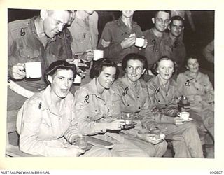 TOROKINA, BOUGAINVILLE. 1945-04-12/13. AUSTRALIAN ARMY MEDICAL WOMEN'S SERVICE AND CAST WERE ENTERTAINED AT THE SERGEANTS MESS AFTER A CONCERT PRODUCED BY 7 FIELD AMBULANCE TROOPS FOR THE ..