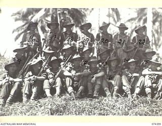 MADANG, NEW GUINEA. 1944-06-30. PERSONNEL OF NO.9 PLATOON, A COMPANY, 24TH INFANTRY BATTALION. IDENTIFIED PERSONNEL ARE:- NX143213 PRIVATE H.C. LOGAN (1); VX147065 PRIVATE E.C. PATTISON (2); N18962 ..