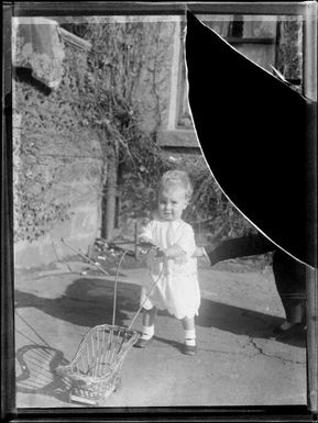 Sheila Chinnery pushing a pram, New Guinea, ca. 1924 / Sarah Chinnery