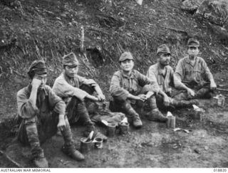 Maprik Area, New Guinea. 1945. Five Japanese prisoners of war (POWs) who surrendered at Ulebilum