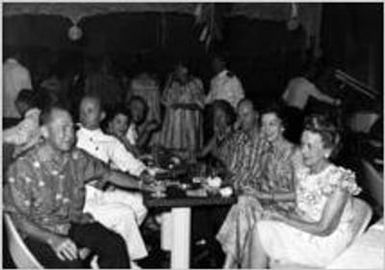 Ginger and Johnny Mercer at a party on a cruise ship