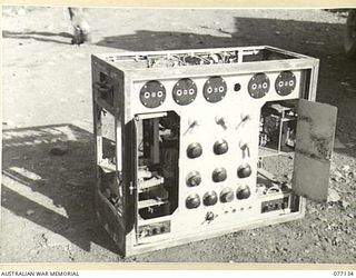 LAE AREA, NEW GUINEA. 1944-11-27. A CAPTURED JAPANESE RADIO TRANSMITTING SET IN THE MUSEUM OF THE ASSISTANT QUARTERMASTER GENERAL (E), 1ST AUSTRALIAN ARMY