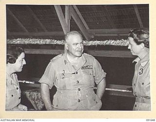 LAE, NEW GUINEA. 1945-05-11. GENERAL SIR THOMAS A. BLAMEY, COMMANDER-IN-CHIEF, ALLIED LAND FORCES, SOUTH WEST PACIFIC AREA (2), WITH LIEUTENANT COLONEL M.J. SPENCER, ASSISTANT CONTROLLER AUSTRALIAN ..