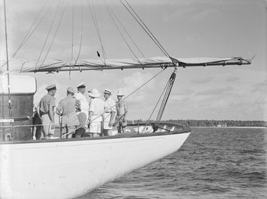 [Group of men and Captain of the Arbutus on a yacht]