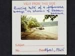 Rusting hulk of a Japanese barge on shores of Rabaul Harbor, Apr 1965