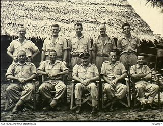 AITAPE, NORTH EAST NEW GUINEA. C. 1945. GROUP PORTRAIT OF PHOTOGRAPHERS OF THREE BEAUFORT BOMBER SQUADRONS WHO TURNED OUT 11,000 PRINTS OF THE WEWAK AREA, WHILE PLANS WERE BEING DRAWN UP FOR THE ..