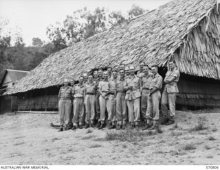 PORT MORESBY, PAPUA, 1944-03-08. "D" OFFICERS' MESS, HQ NEW GUINEA FORCE. IDENTIFIED PERSONNEL ARE: QX7931 CAPTAIN H.C. MATHIESON SO (SIGNALS), III STORES ( ); VX101929 LIEUTENANT H. MORROW, GSO ..