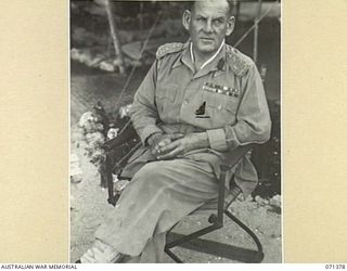 FINSCHHAFEN AREA, NEW GUINEA. 1944-03-20. VX221 BRIGADIER F.K. NORRIS, CBE, DSO, ED, (1), DEPUTY DIRECTOR OF MEDICAL SERVICES, AT HEADQUARTERS, 2ND AUSTRALIAN CORPS