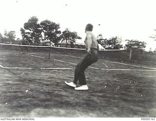 HOLSWORTHY INTERNMENT CAMP, NSW, C.1915. GERMAN PRISONERS FROM PACIFIC ISLANDS PLAYING TENNIS. (ORIGINAL ALBUM HELD IN AWM ARCHIVE STORE). (DONOR: R.A. SANDS)