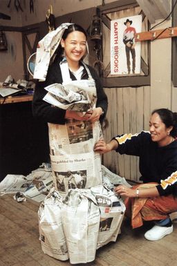 Congregational Christian Church in Samoa; Talaitipu in newspaper wedding dress, with designer Liva Asi.