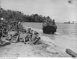 NAMBARIWA, NEW GUINEA. 1944-01-21. AN AMPHIBIOUS "DUKW" ARRIVING FROM KELANOA WITH REINFORCEMENTS AND STORES FOR THE 2/15TH INFANTRY BATTALION