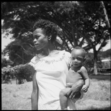 Woman holding a baby on her hip, New Guinea, ca. 1936, 2 / Sarah Chinnery