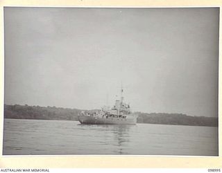 MUSCHU ISLAND, NEW GUINEA, 1945-11-26. THE CORVETTE HMAS KIAMA, WHICH HAS BEEN ENGAGED CHIEFLY IN OCEAN CONVOY WORK IN THE SOUTH WEST PACIFIC AREA