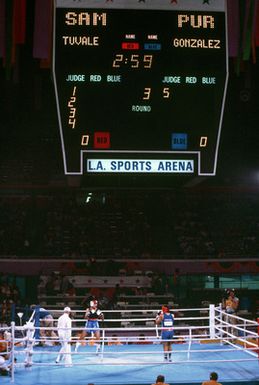 Army SPECIALIST 4 Aristides Gonzalez, from Fort Bragg, North Carolina, represents Puerto Rico in the boxing competition at the 1984 Summer Olympics. His opponent is Paulo Tuvale of Samoa