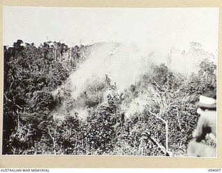 WEWAK AREA, NEW GUINEA, 1945-07-14. 2/1 FIELD REGIMENT AND 2/3 FIELD REGIMENT, FIRED 4,500 25-POUNDER SHELLS OVER A PERIOD OF 45 MINUTES. THIS WAS FOLLOWED BY 350 3-INCH MORTAR BOMBS AND 500 ROUNDS ..