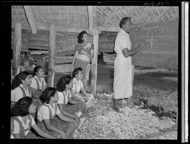 A Samoan teacher taking his senior students in geography