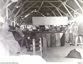 LAE, NEW GUINEA, 1946-01-01. THE MAIN SORTING ROOM, 7 BASE POST OFFICE