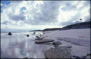 Beach and cloudy skies