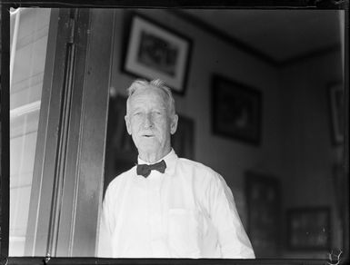 Portrait of Alfred [James?] Tattersall in the doorway of his house, Apia, Western Samoa