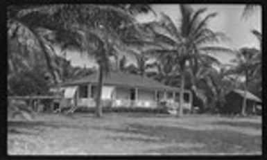 People on the porch of a house