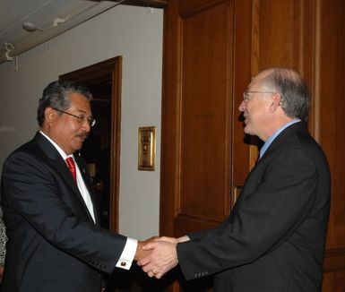 Secretary Ken Salazar with [visiting delegation led by the] President of Palau, [Johnson Toribiong, at Interior headquarters, Washington, D.C.] - 3/12/2009