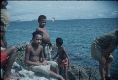 Raku boys near the sea : Port Moresby, Papua New Guinea, 1953 / Terence and Margaret Spencer