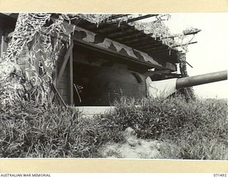 PORT MORESBY, PAPUA, NEW GUINEA. 1944-03-27. THE NO.2 GUN EMPLACEMENT HOUSING A 6 INCH GUN AT PAGA BATTERY, COAST ARTILLERY, AT THE MOUTH OF THE HARBOUR