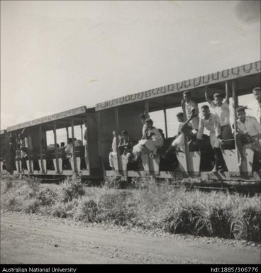 Workers riding the train