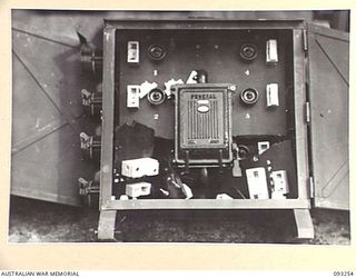 TOROKINA, BOUGAINVILLE, 1945-06-21. DAMAGED EQUIPMENT RECEIVED BY 16 ADVANCED ORDNANCE DEPOT. THE DAMAGE WAS DUE TO FAULTY MATERIALS NOT BAD PACKING