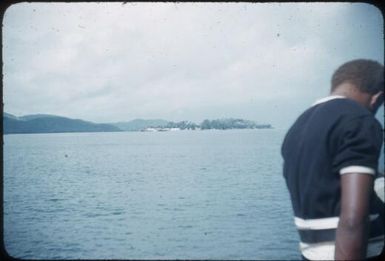 Methodist Mission seen in the distance from the ship : East Cape, D'Entrecasteaux Islands, Papua New Guinea, 1956-1959 / Terence and Margaret Spencer