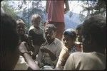 Ndemang Kuk and others gambling on a card game