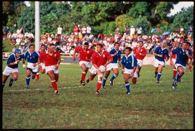 Tongan national rugby league team playing another team,Tonga