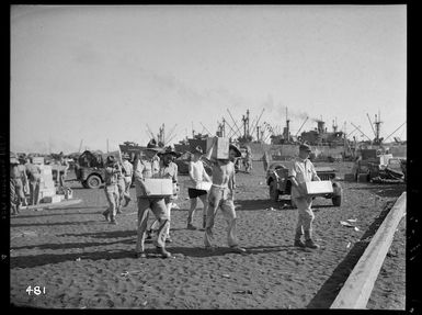 World War 2 New Zealand soldiers loading equipment and supplies in New Caledonia