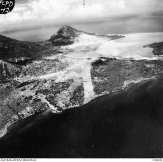 RABAUL, NEW BRITAIN. C. 1944. AERIAL VIEW OF LAKUNAI AERODROME LOOKING SOUTH EAST